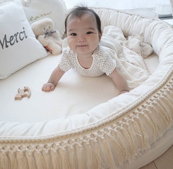 Juniornest og legetæppe